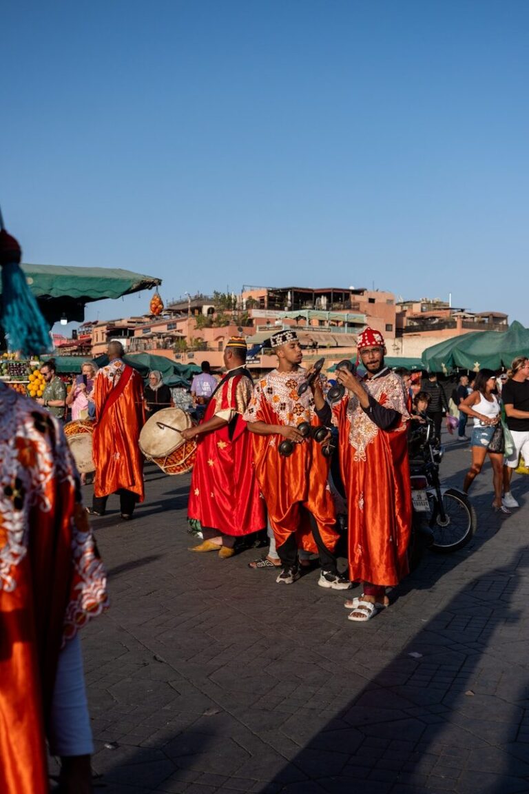 A group of people standing around each other